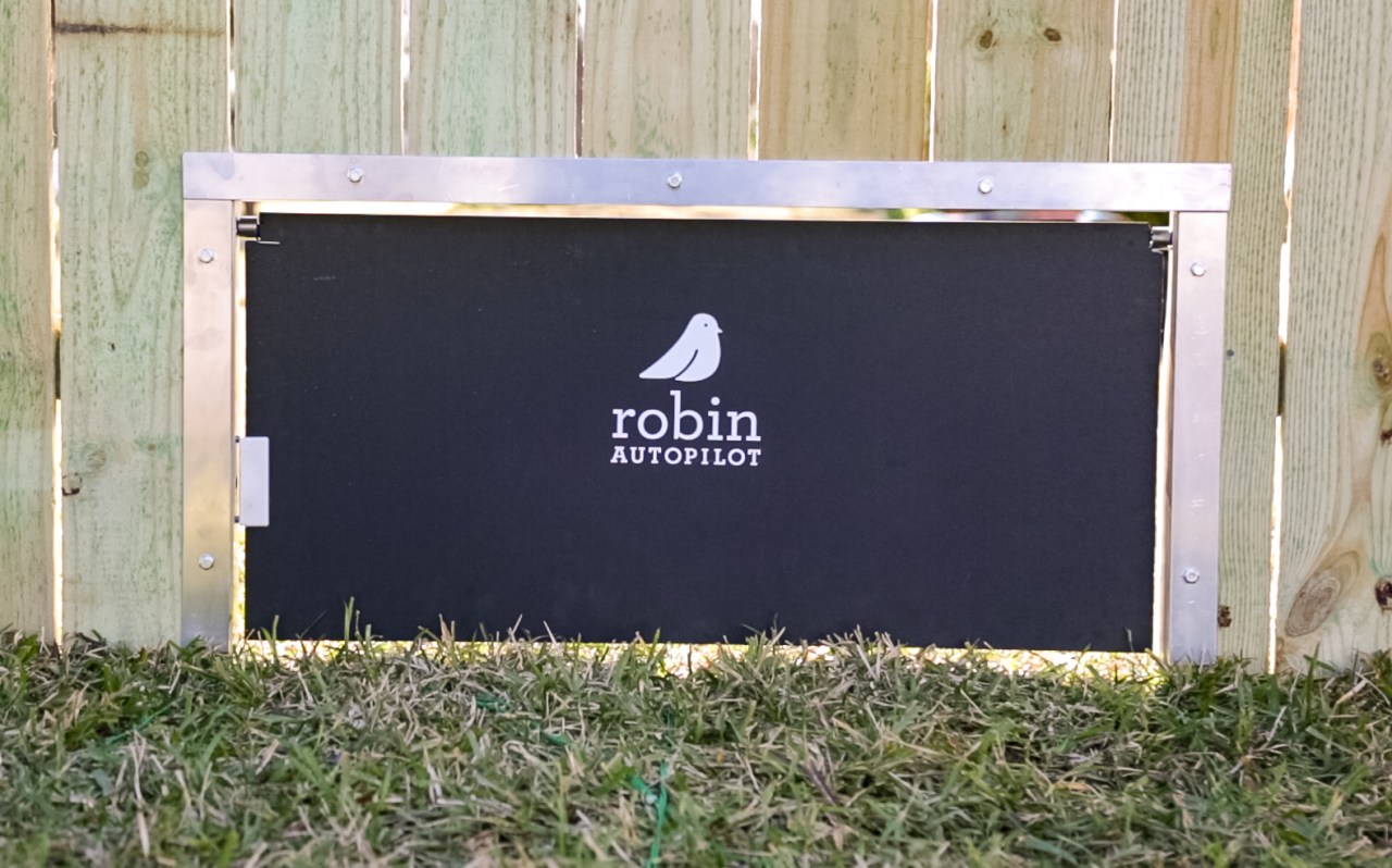 Innovative Solutions in Landscaping: Robin’s Patented Doggie Door for Robotic Mowers