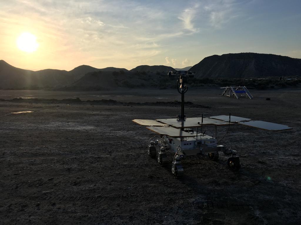 Rolling and Hopping Robots: Earth’s Testbed for Cosmic Exploration