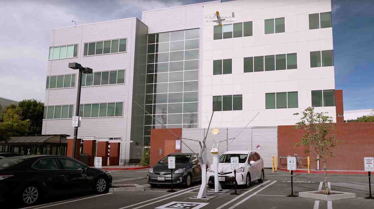 The Future of Drone Delivery: A Network Model Inspired by Ridesharing